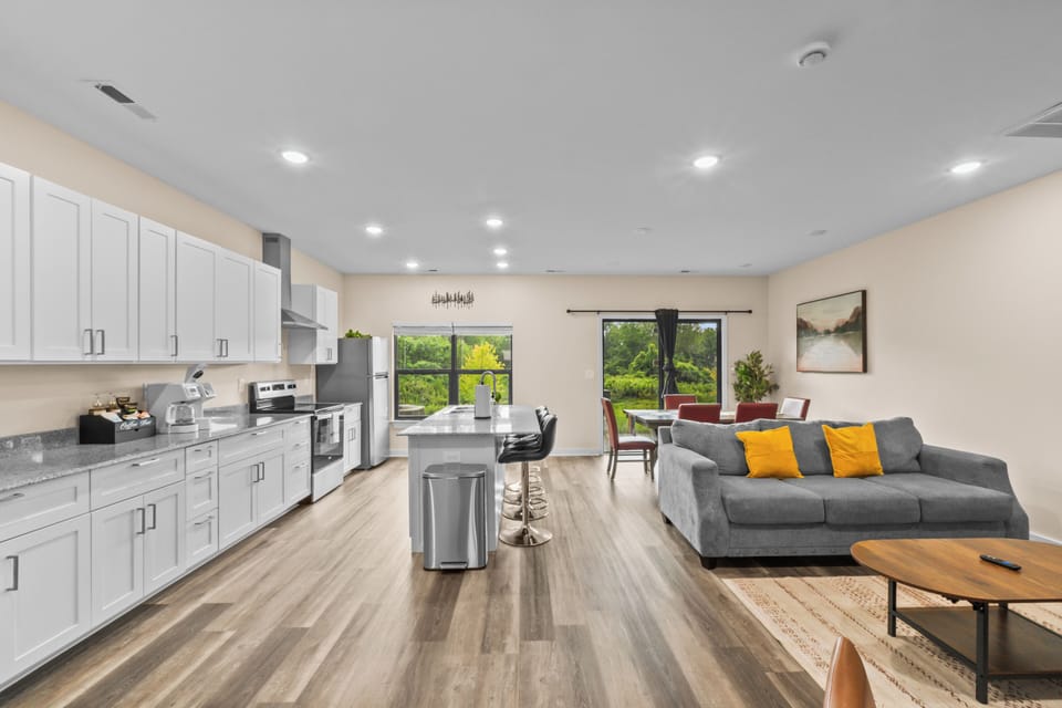 This open-plan living area boasts generous space and natural light.