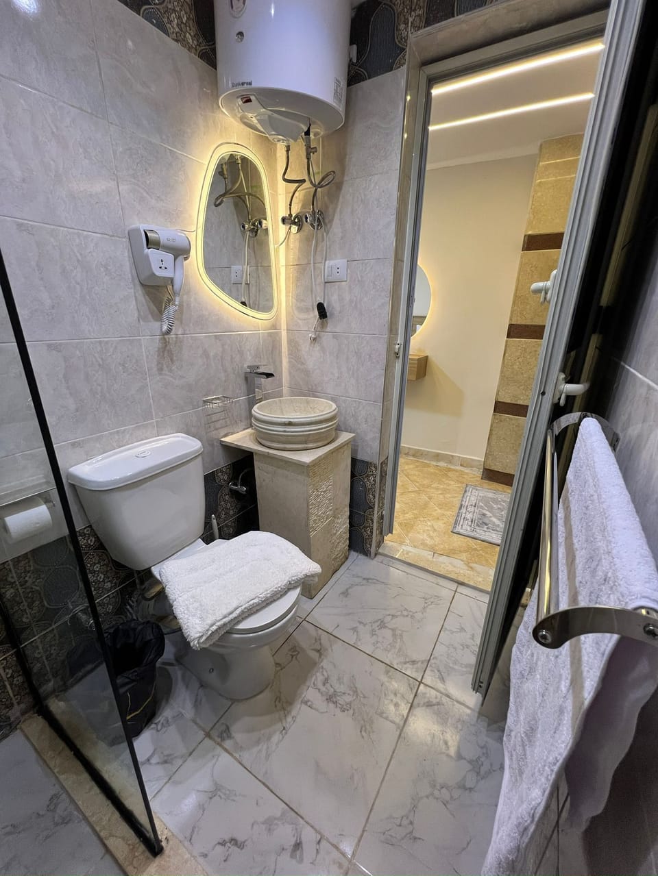 Combined shower/tub, hair dryer, bathrobes, slippers