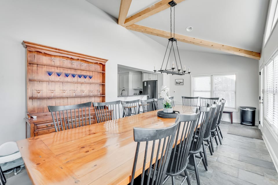 Dining Room: Gather around the stunning wooden table for delightful meals and memories!