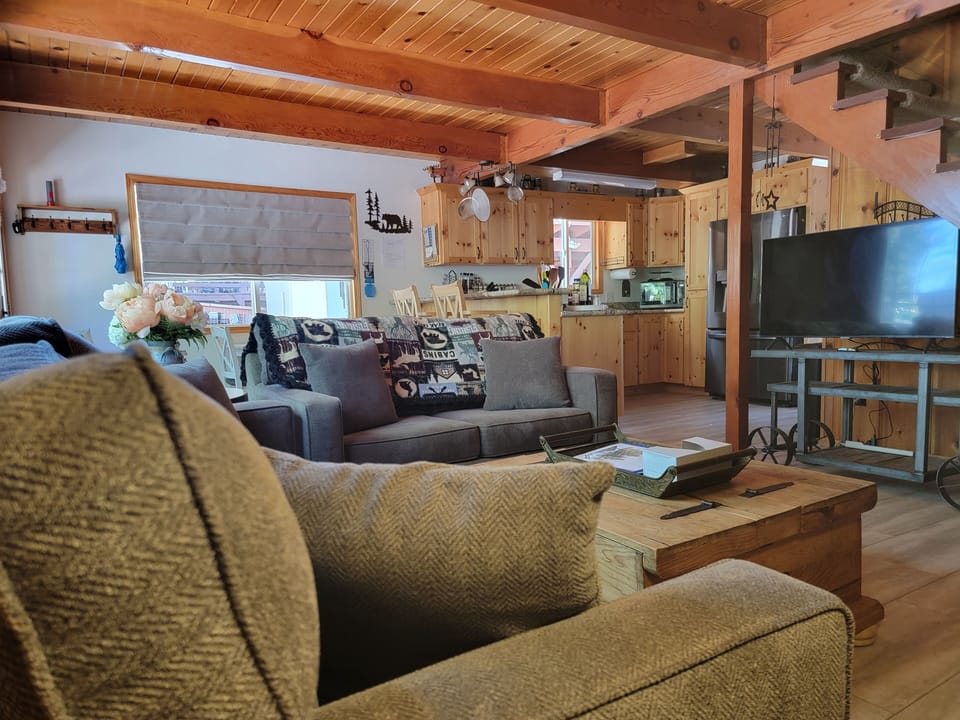 View of Living, Dining Rooms and Kitchen