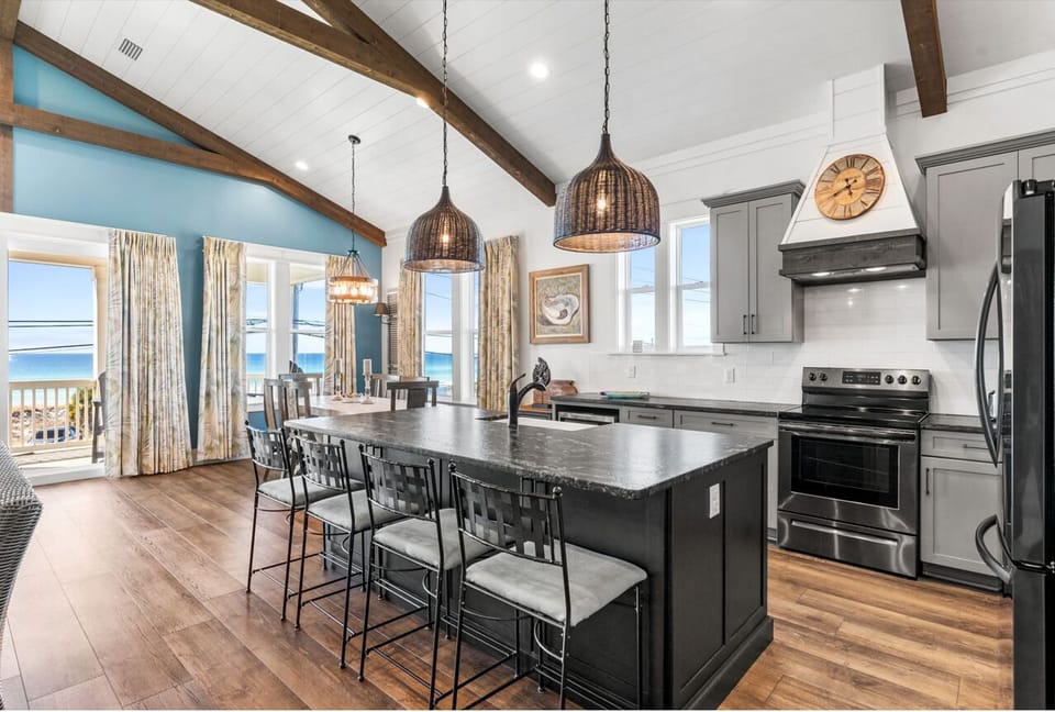 You can utilize the kitchen island and expansive counter space for food prep or appetizers when the family gathers.