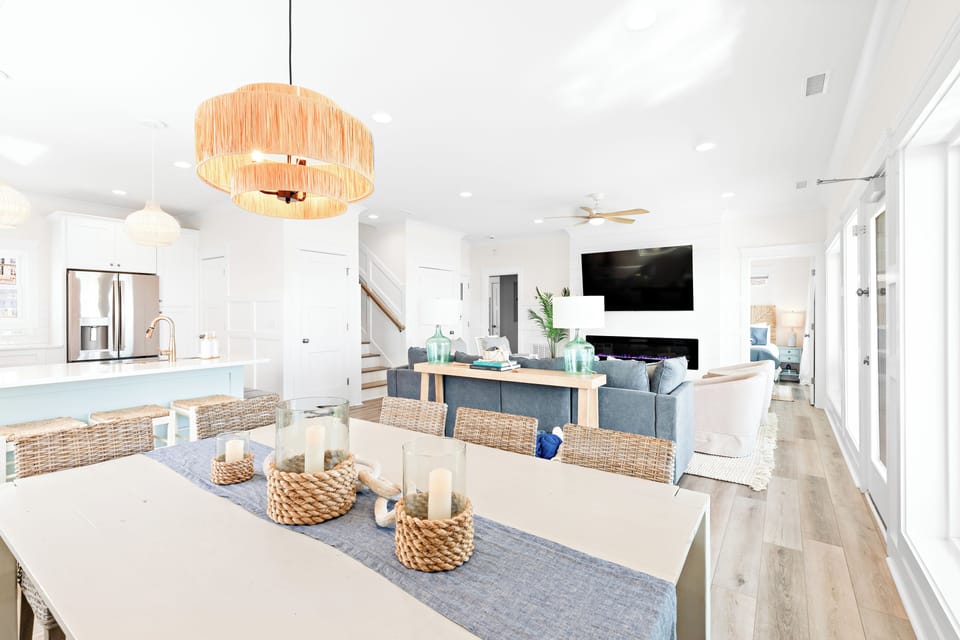 Custom-built oversized table and dining benches housing board games and puzzles