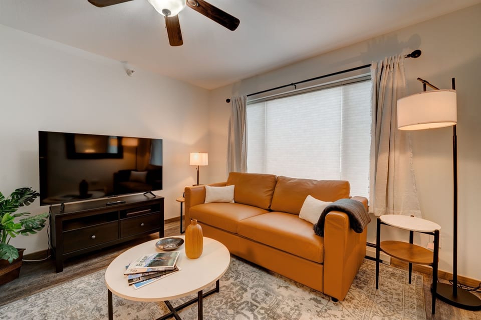 Modern leather sofa easily converts to a comfortable queen bed - perfect for a great night's sleep!