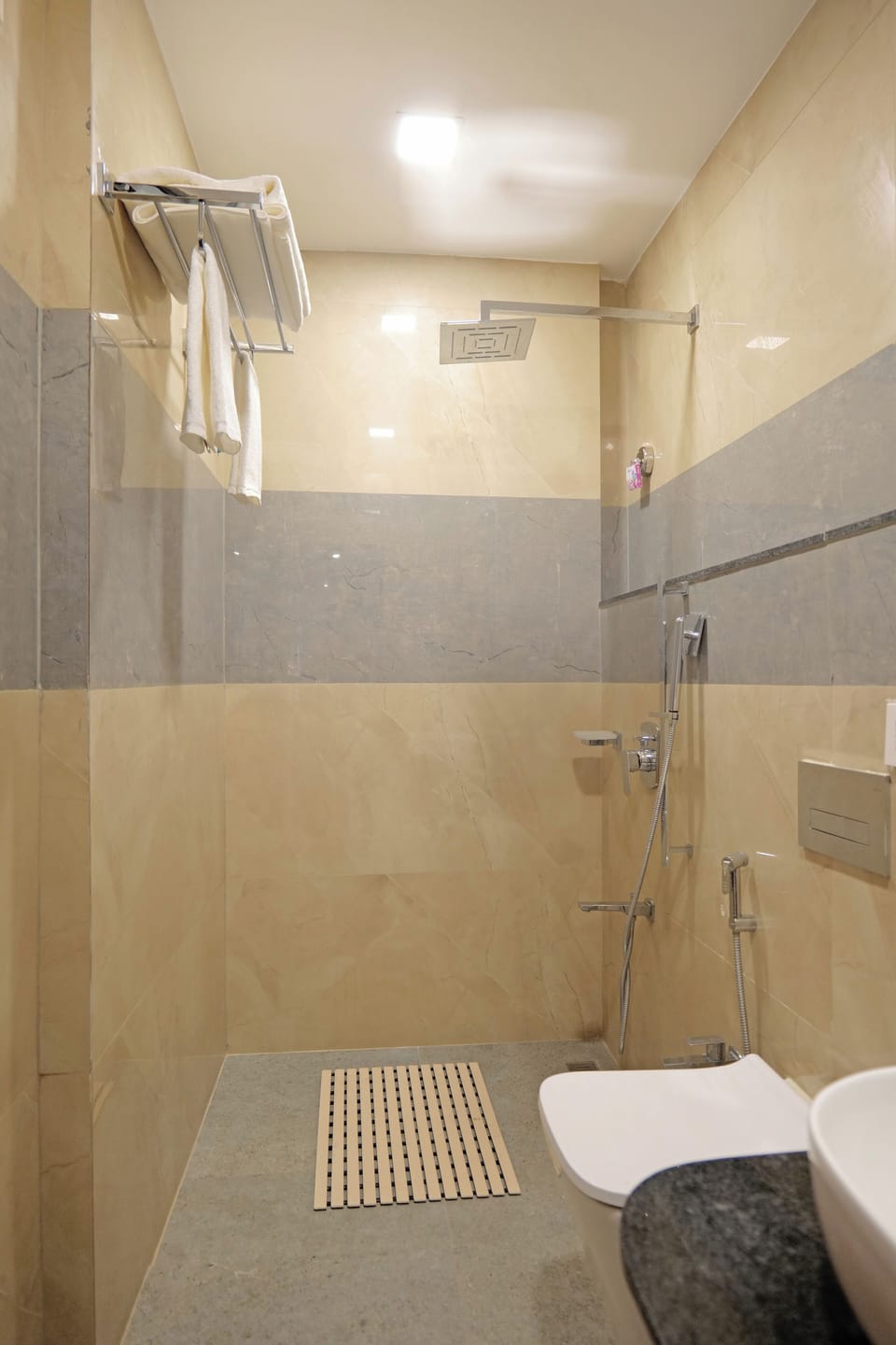 Shower, free toiletries, slippers, towels