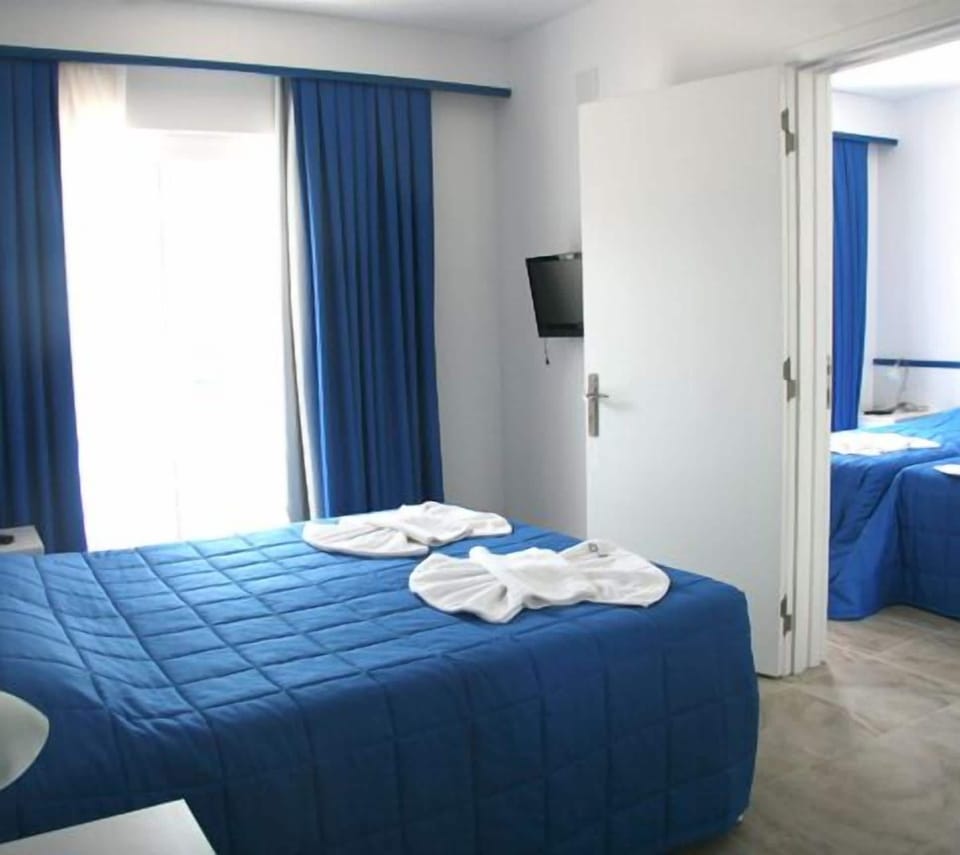 Family Room, 2 Bedrooms, Connecting Rooms | Minibar, in-room safe, free WiFi, bed sheets