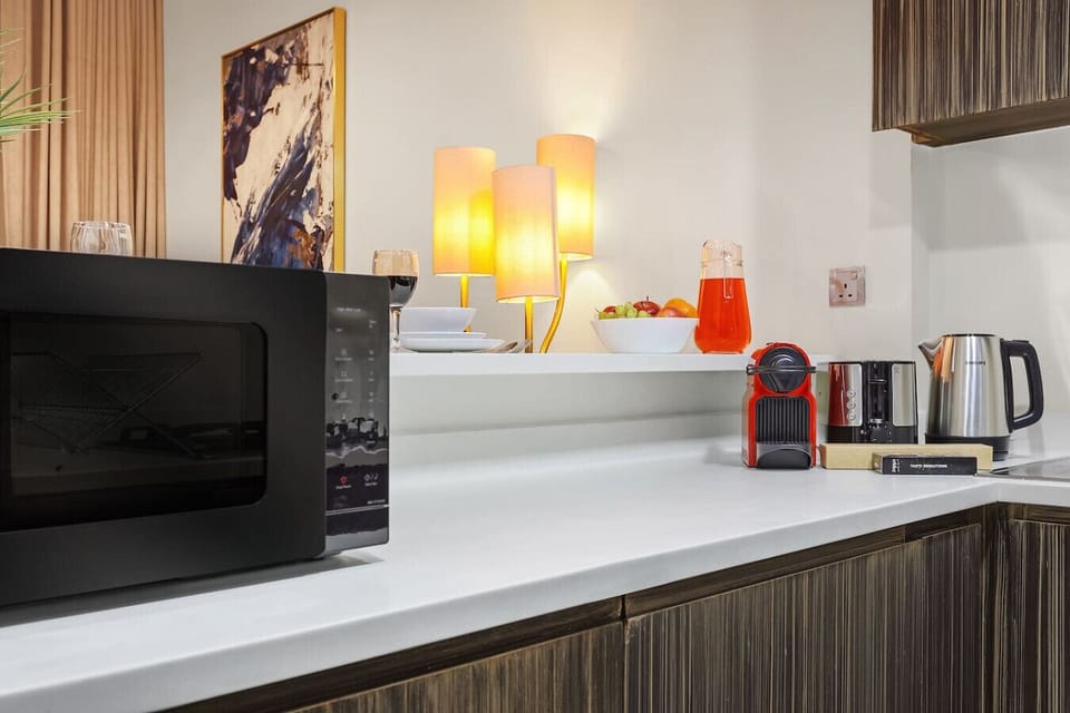 Kitchen: Modern appliances and stylish decor create a delightful cooking experience!