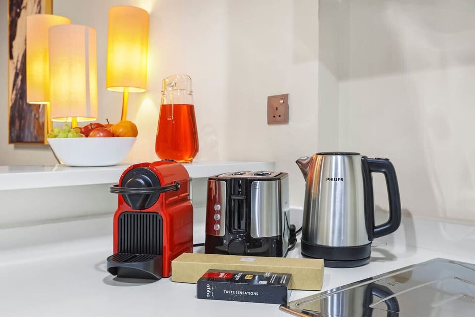 Refreshments Corner: Nespresso, kettle, and treats await in your stylish retreat!
