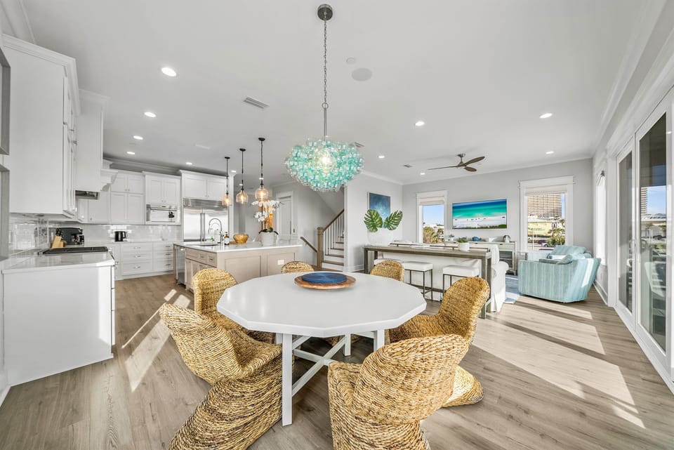 Step into your bright, open-concept haven where coastal charm meets modern luxury. Natural textures and ocean hues create the perfect retreat.