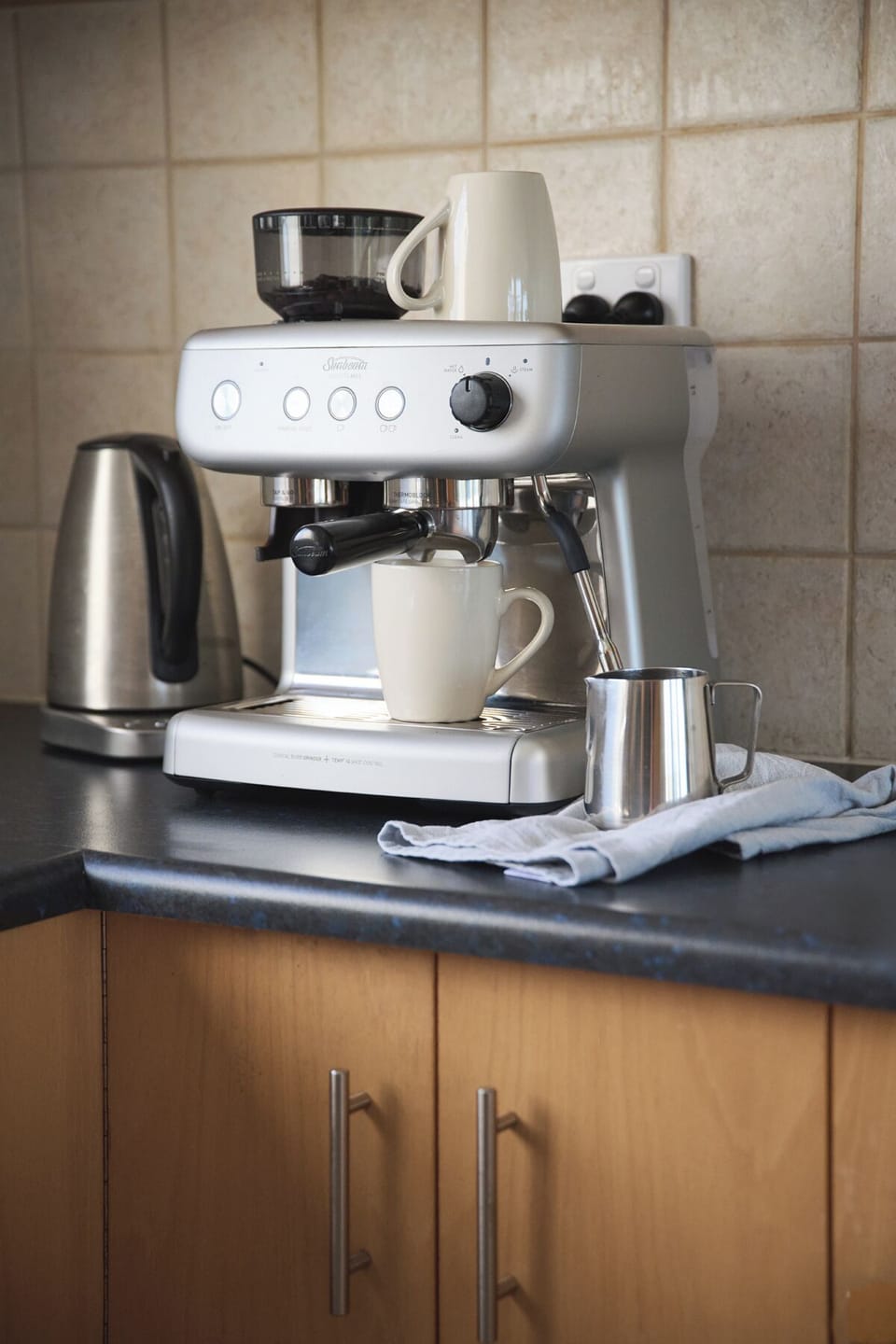 Coffee machine essential, filled with beans.