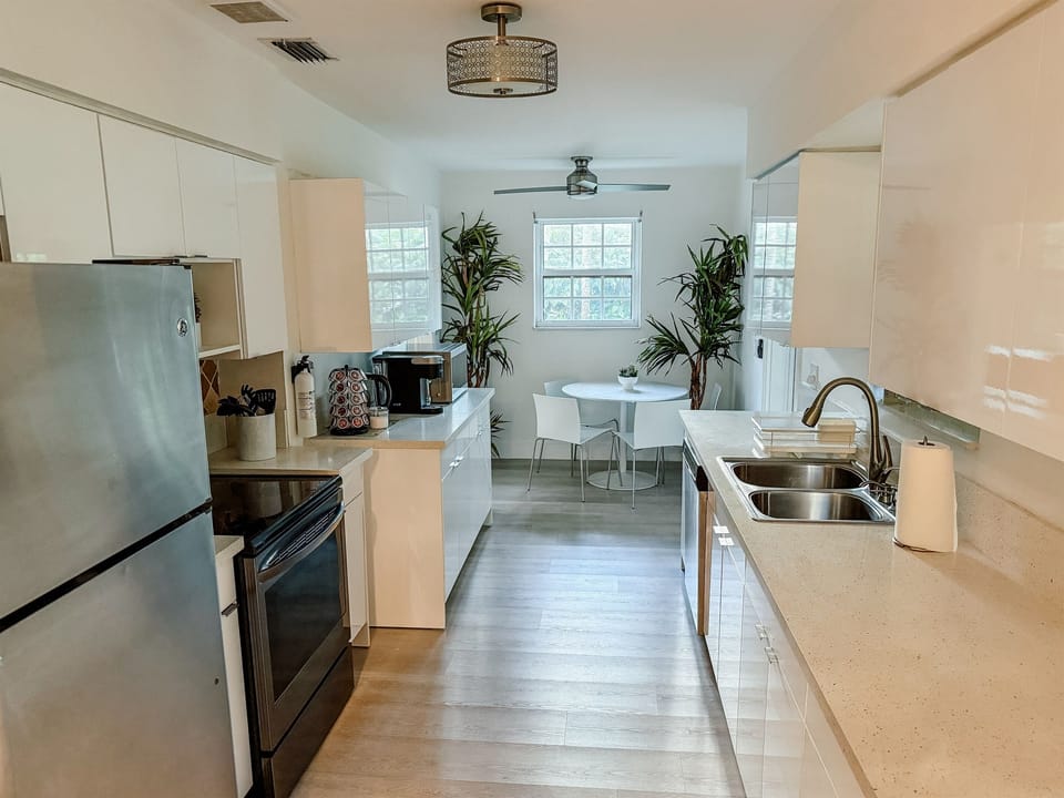 Our kitchen is well-integrated into the house and has it's own table that can seat four people.
