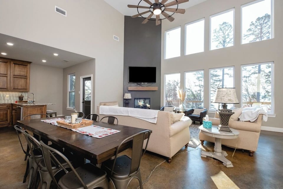 Beautiful sunlit family and dining room with a great lake view.