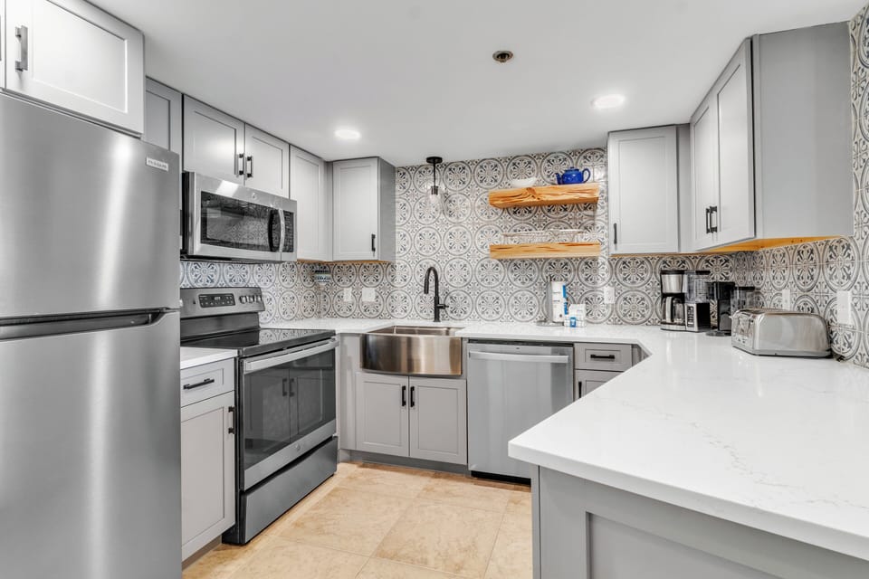 Newly renovated kitchen. Phoenix East 910. 2 bedrooms & 2 bathrooms. Sleeps 9. Orange Beach, AL Managed by Island Rentals