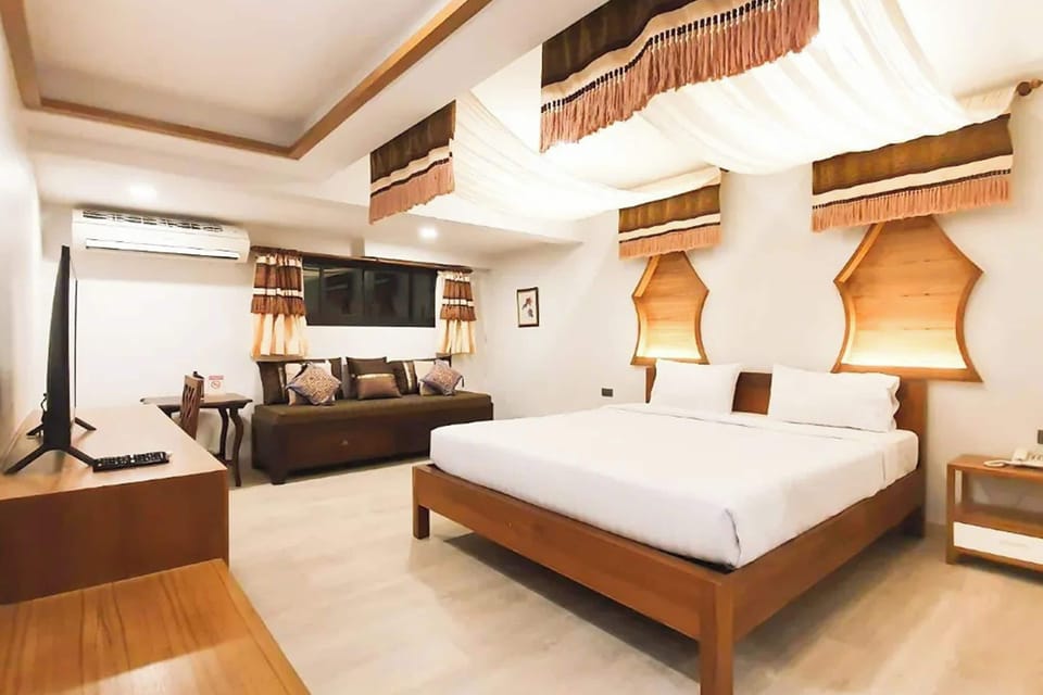 Premium Room | Blackout drapes, iron/ironing board, free WiFi, bed sheets