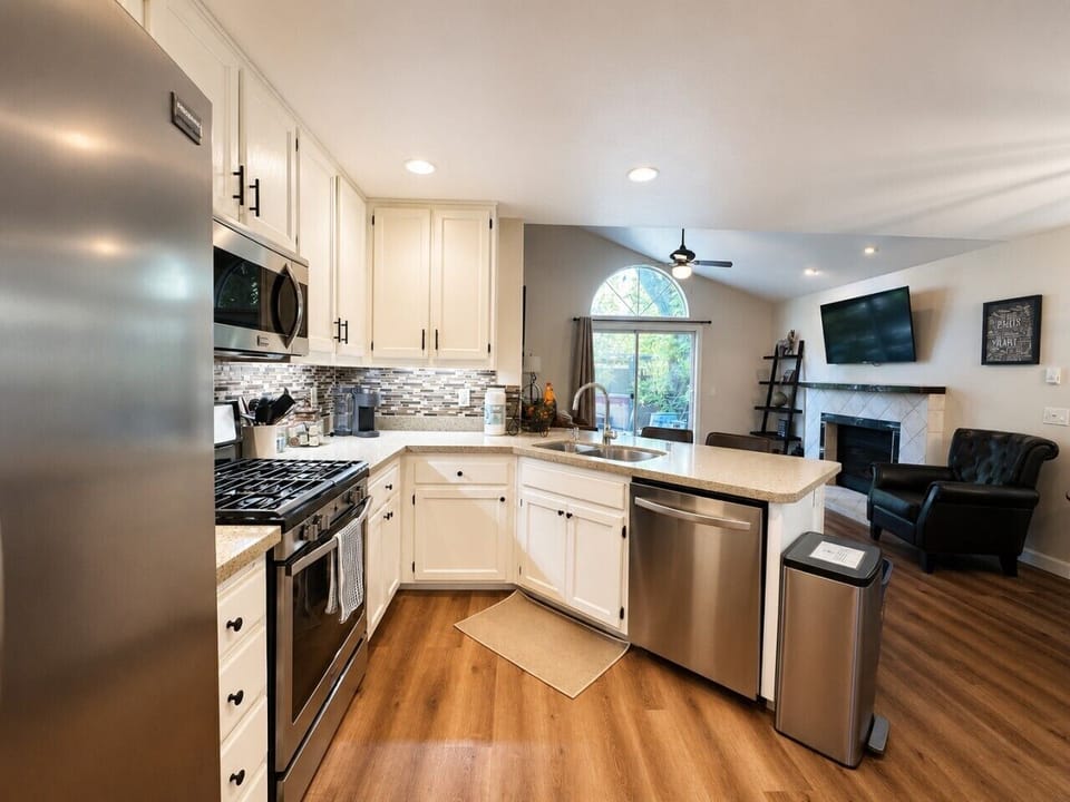 Updated kitchen opens to a living room space