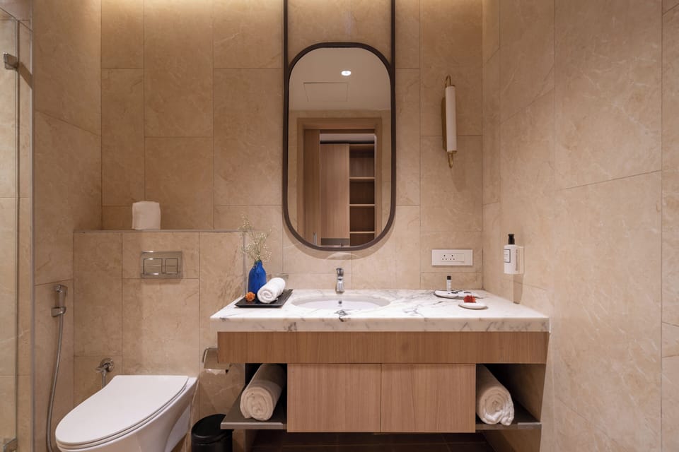 Boutique Twin | Bathroom | Shower, slippers, towels, soap