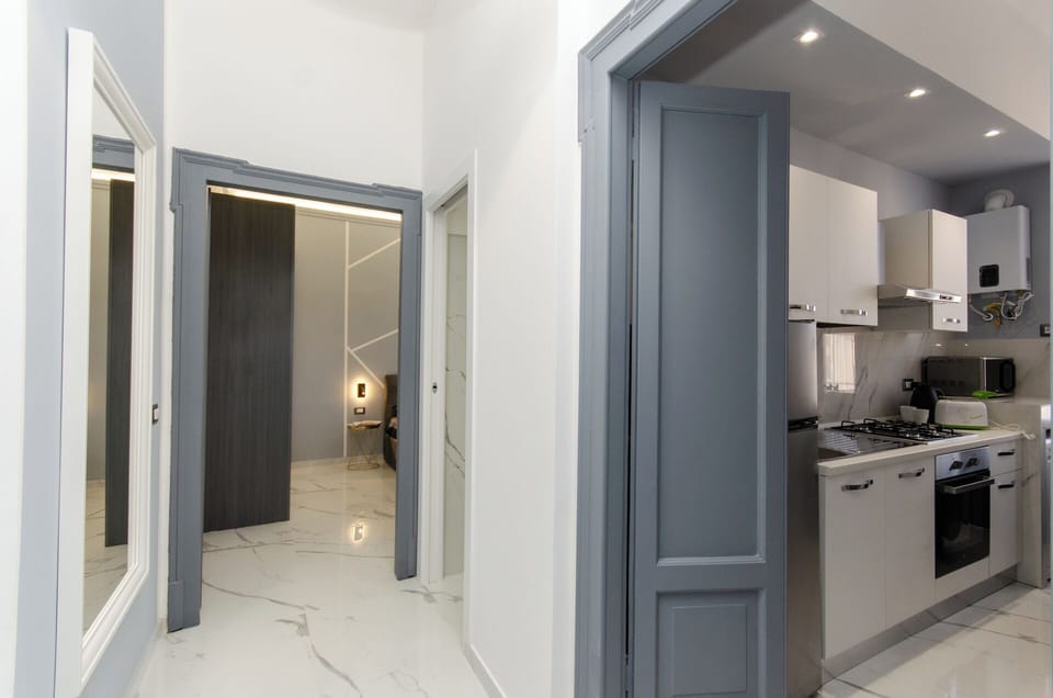 Apartment, Courtyard View | Living area | 50-inch Smart TV with cable channels