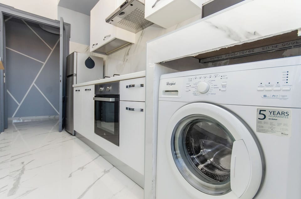 Apartment, Courtyard View | Private kitchen | Full-size fridge, microwave, oven, stovetop