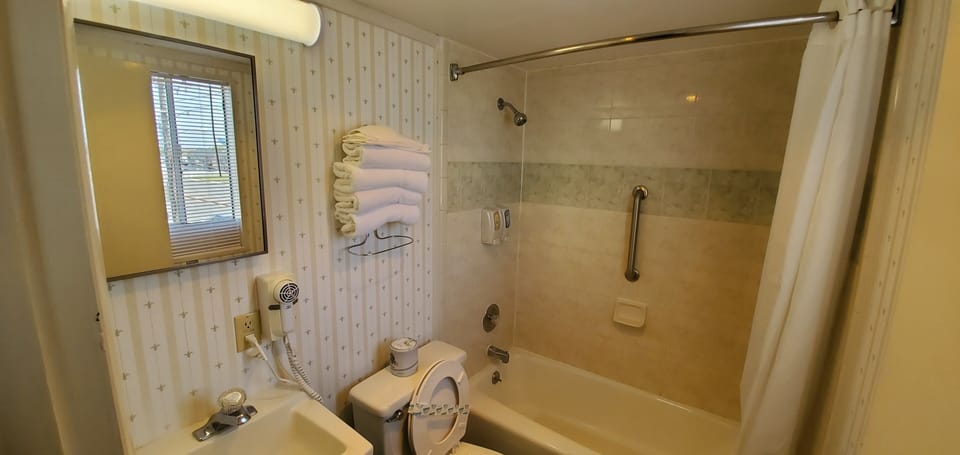 Room, 2 Queen Beds, Kitchenette | Bathroom | Combined shower/tub, hair dryer, towels
