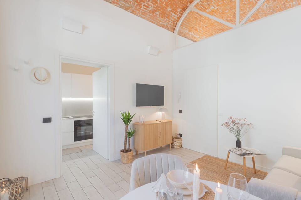 Apartment (1 Bedroom) | Living area | 32-inch flat-screen TV with cable channels