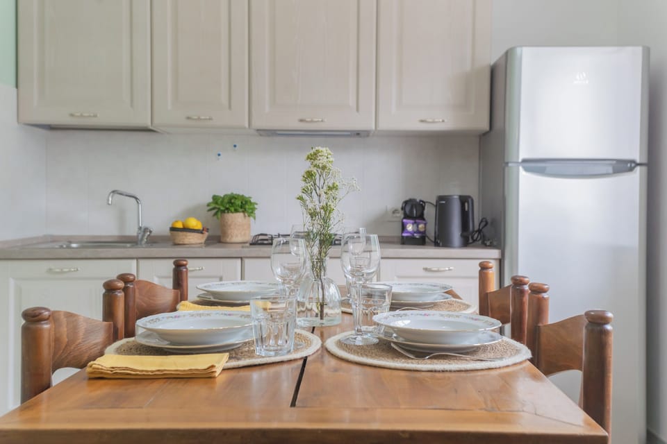 Apartment (2 Bedrooms) | Private kitchen | Microwave, espresso maker, electric kettle, highchair