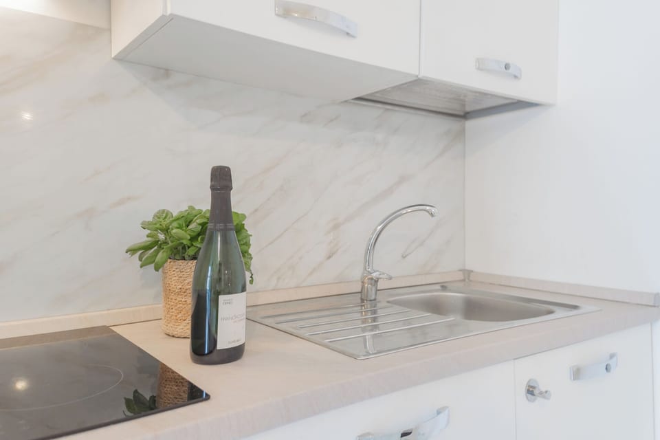 Apartment (1 Bedroom) | Private kitchenette | Oven, espresso maker, electric kettle, highchair