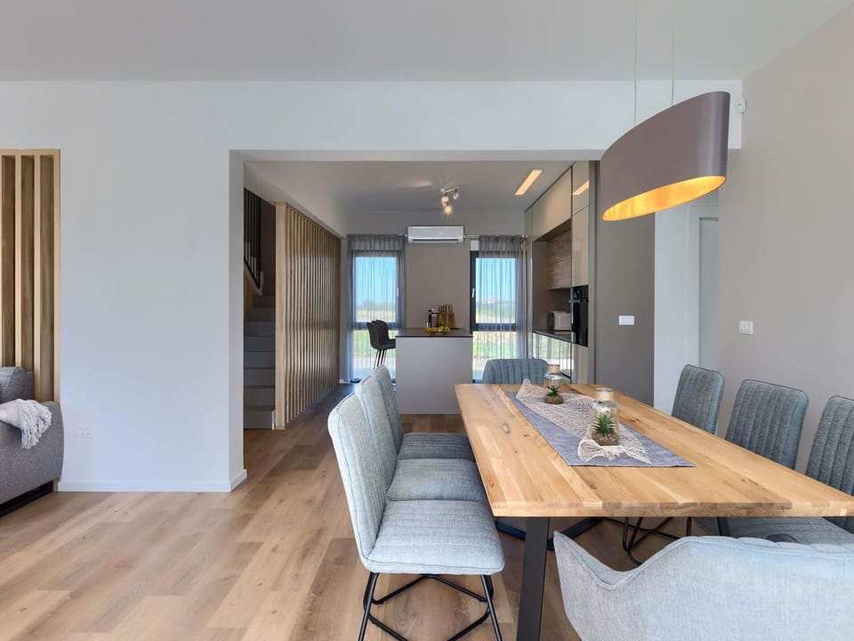 Furniture, Interior Design, Flooring, Wood, Floor, Dining Room, Kitchen & Dining Room Table, Ceiling, Table, Chair