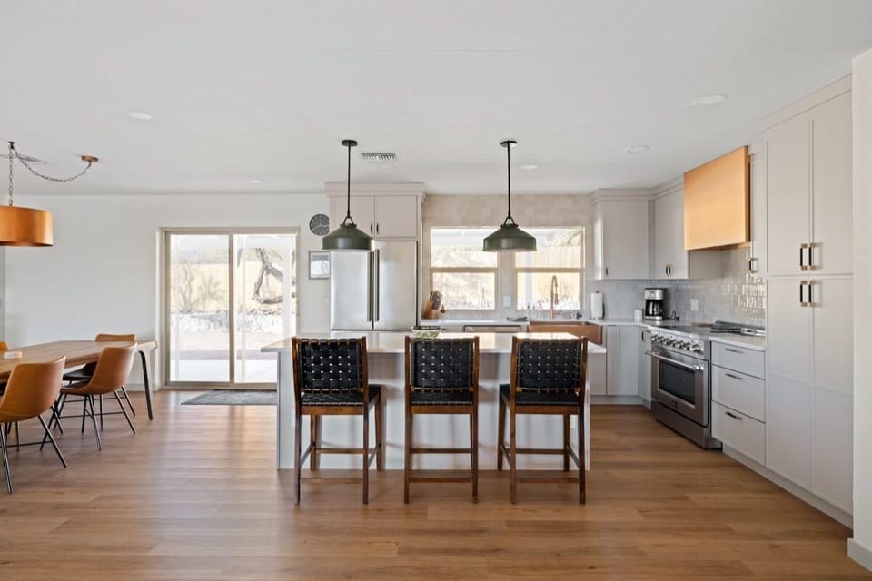 Gather around the island or the table - this kitchen was made for shared meals.