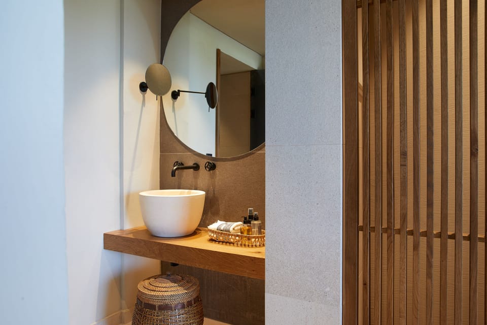 Shower, rainfall showerhead, hair dryer, towels