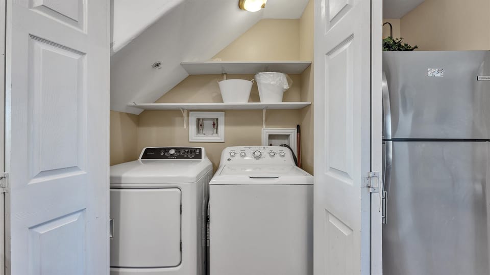 Washer & dryer conveniently located off the kitchen.