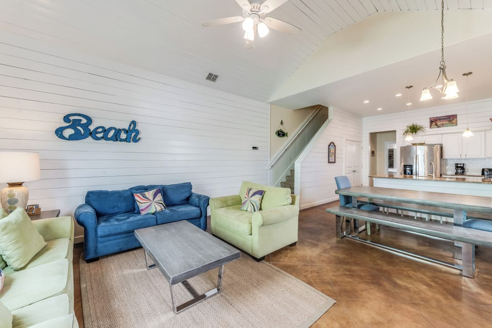 Living Area - Open and airy living space perfect for socializing after a day in the sun
