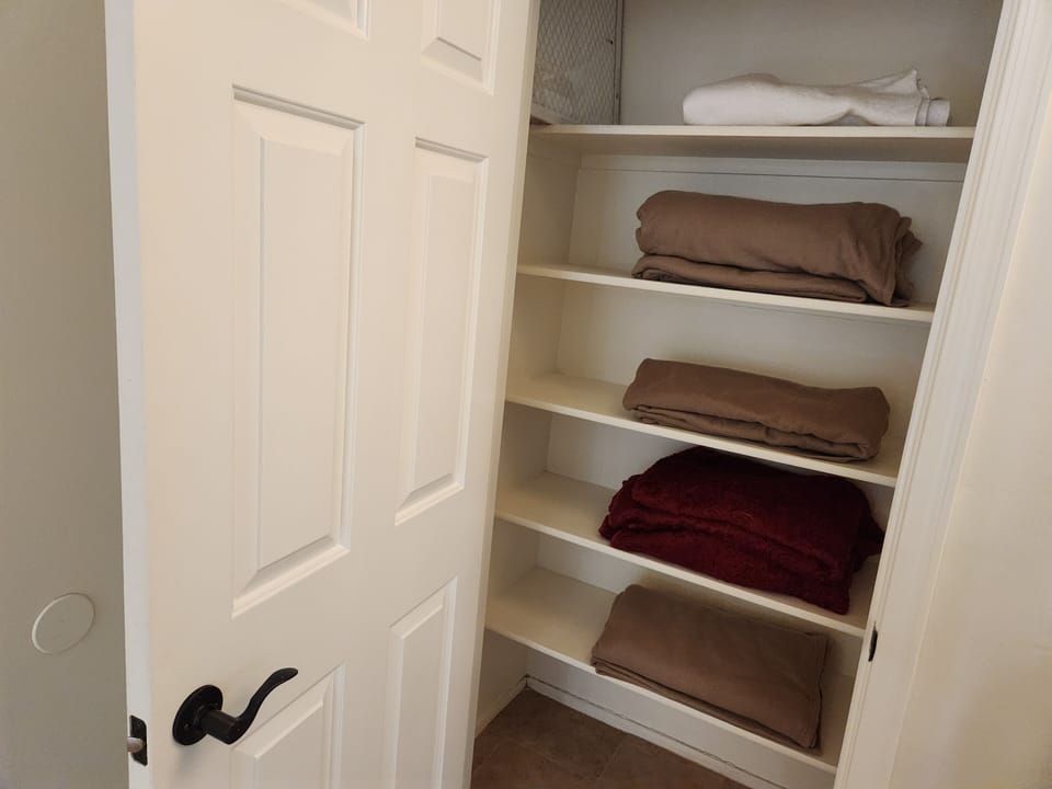 Extra blankets and sheets in upstairs linen closet