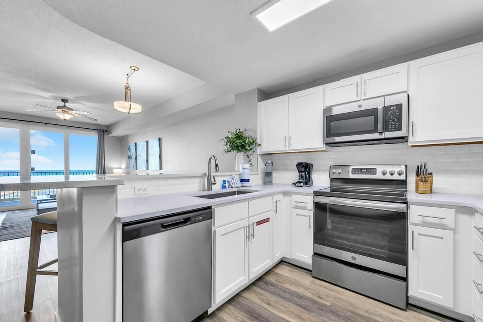 Condo, Multiple Beds (Calypso 3-1107) | Private kitchen | Oven, toaster