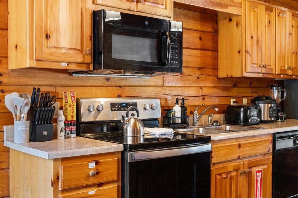 Fully equipped kitchen with essential appliances