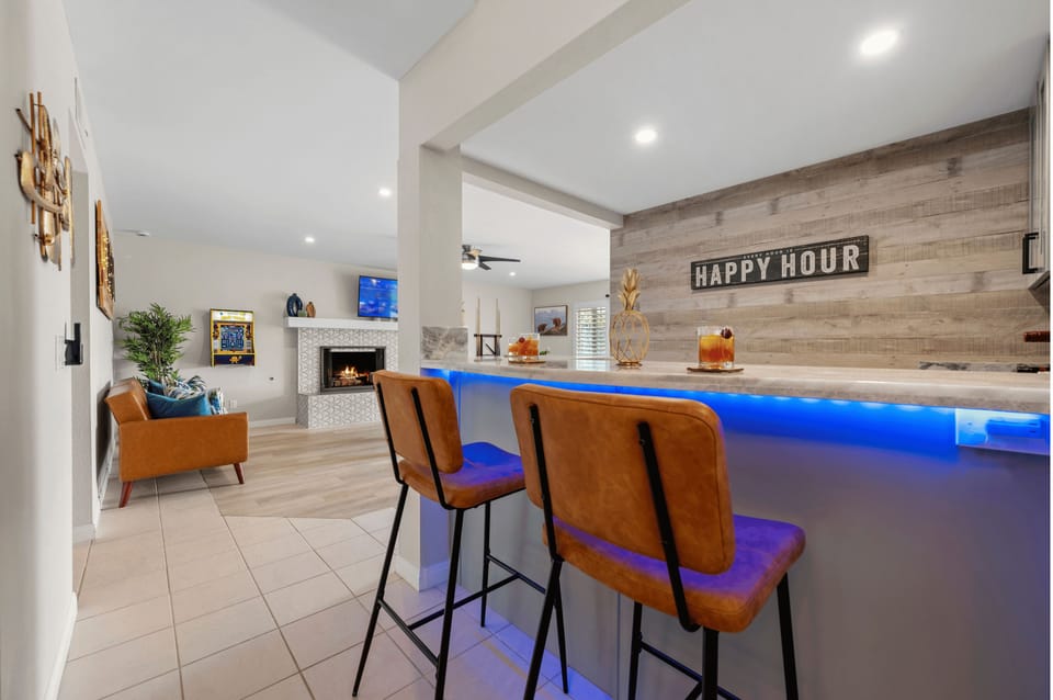 The ultimate chill zone: bar seating, pool table, and arcade vibes
