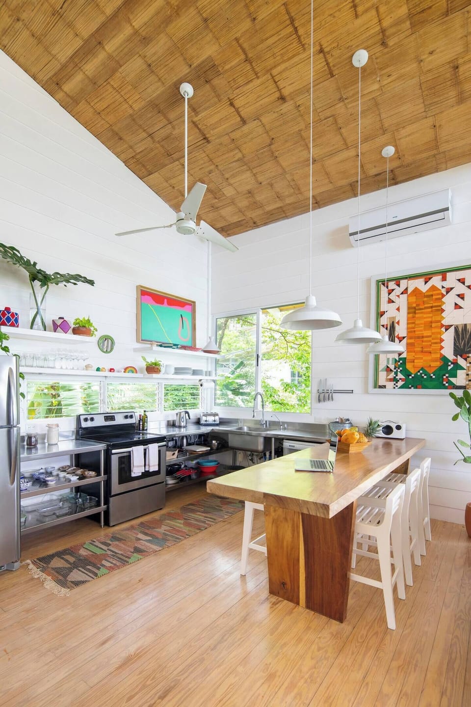 Fully stocked kitchen with sound system and jungle views