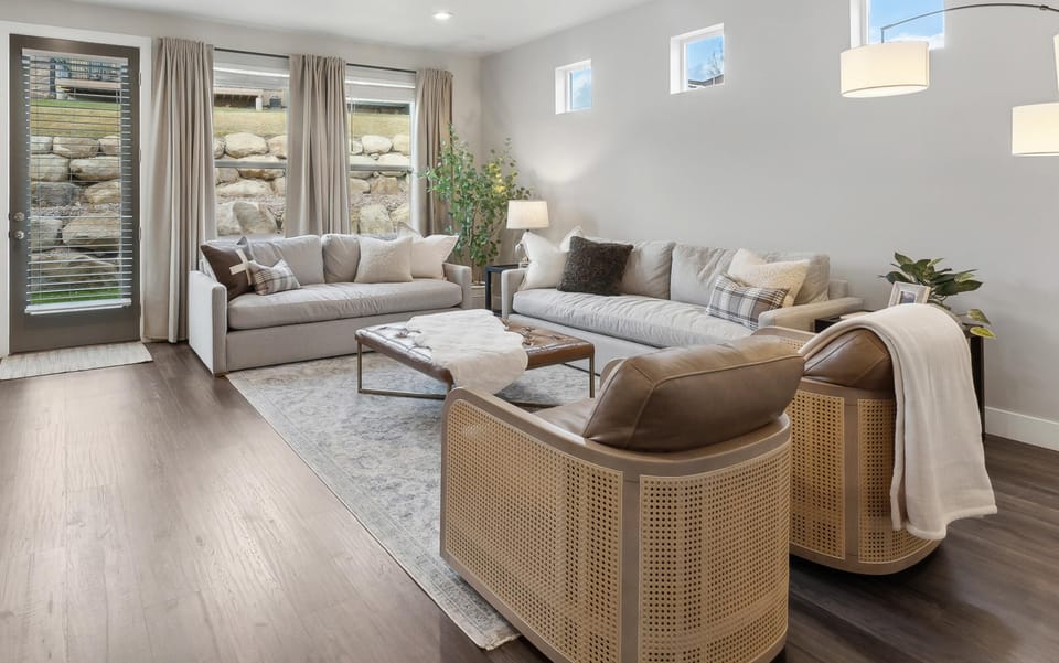 Comfort meets style in the Gather Room with plush seating and mountain-inspired décor.