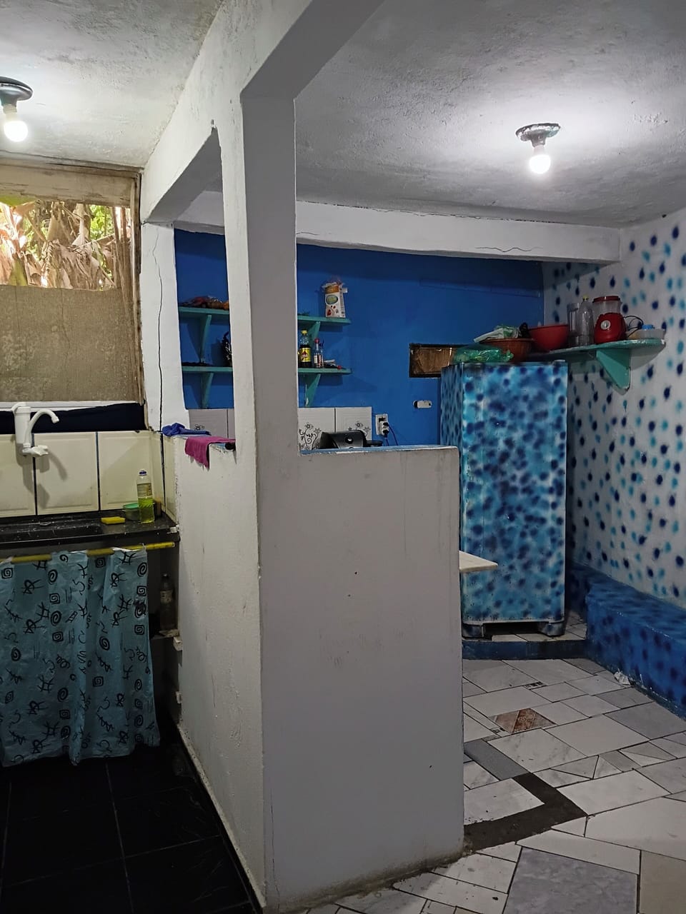 Full-size fridge, blender, cookware/dishes/utensils, cleaning supplies