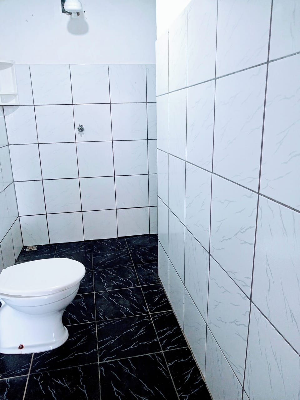 Economy Triple Room, Beach View | Bathroom | Shower, towels, toilet paper