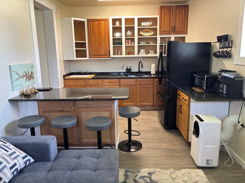 View from living area of bar for meals and kitchen