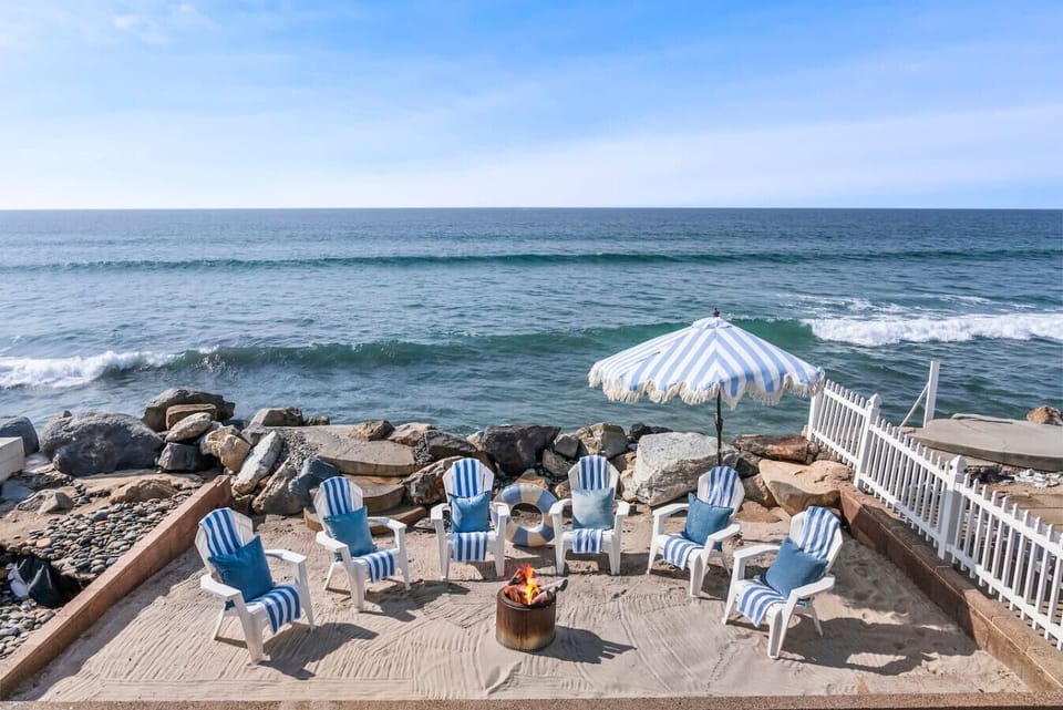 Oceanfront rental in Oceanside California, Beachfront vacation rental, Oceanside beach house, Direct beach access nearby, Private sandy backyard, Fire pit on the beach, No street between house and ocean, Walk to Oceanside Pier, Walk to restaurants and cof