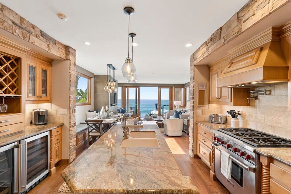 Oceanfront rental in Oceanside California, Beachfront vacation rental, Oceanside beach house, Direct beach access nearby, Private sandy backyard, Fire pit on the beach, No street between house and ocean, Walk to Oceanside Pier, Walk to restaurants and cof