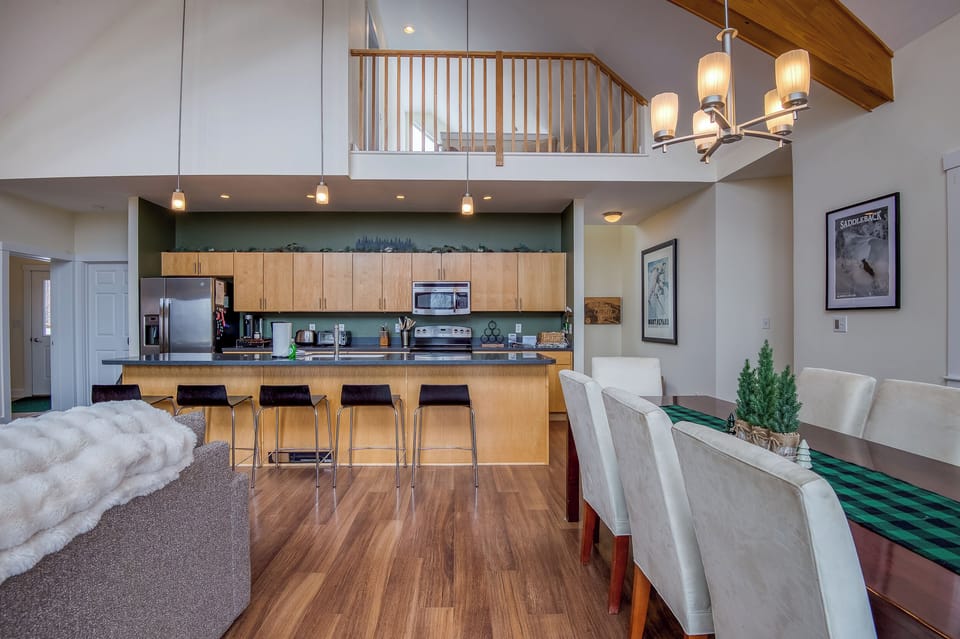 Dining table with view of kitchen