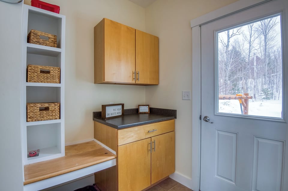 Entryway with cubbies for ski gear!