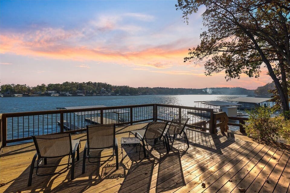 The best of both worlds - Happy Hour includes TWO beautiful houses situated on the lake in Gravois Mills.