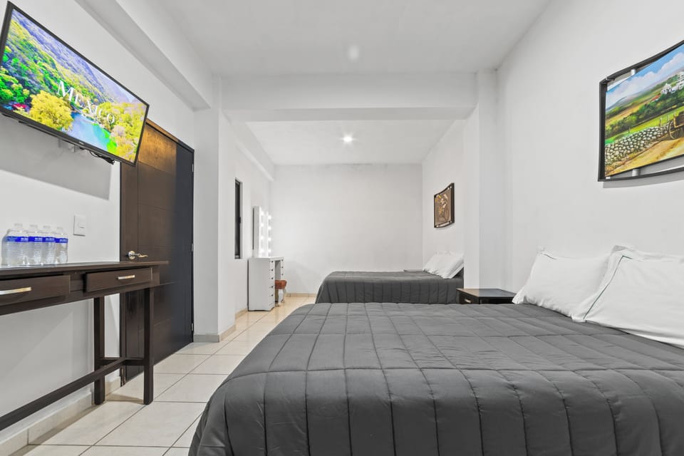 Comfort Quadruple Room | Blackout drapes, iron/ironing board, WiFi (free)