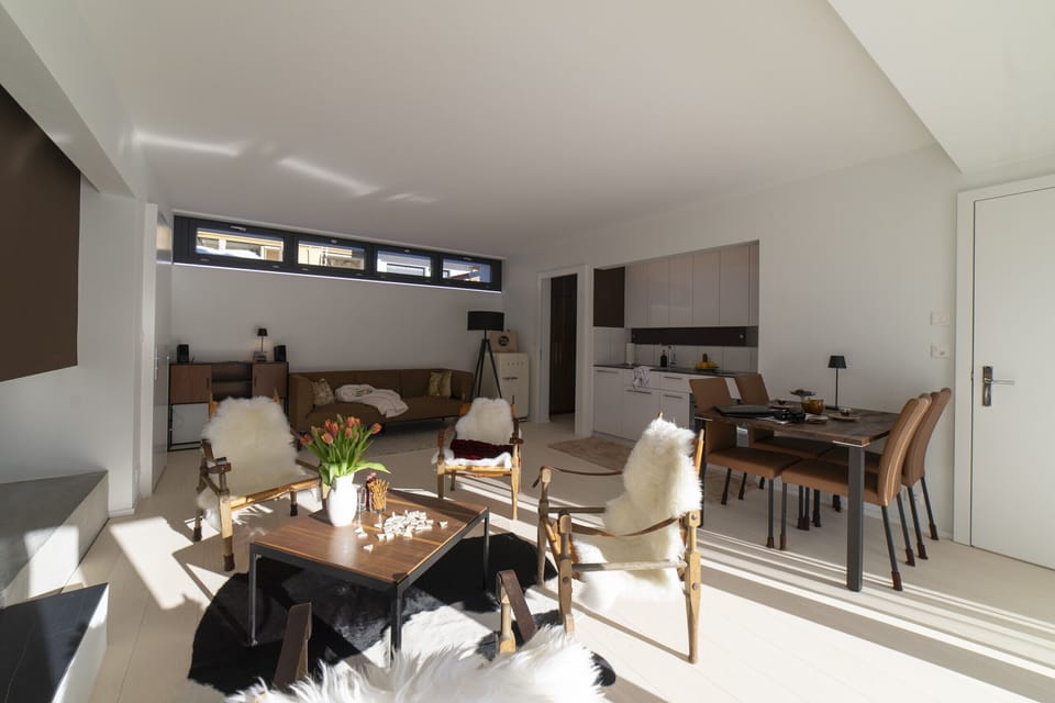 Open-plan living and dining area with kitchen