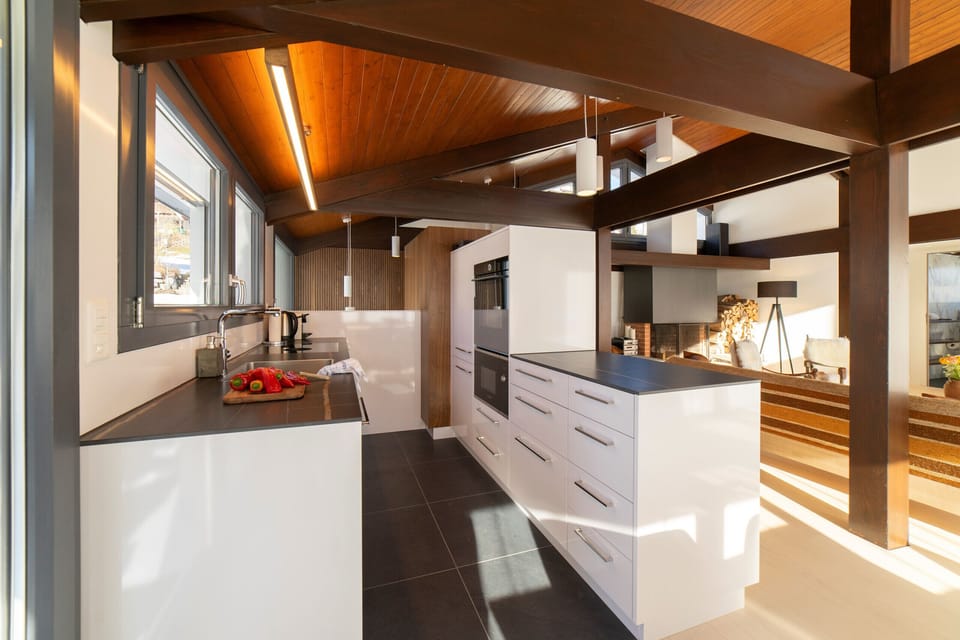 A modern open-plan kitchen-diner with plenty of natural light