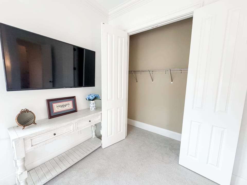 BR 2 features spacious closet, wall-mounted flat screen smart TV