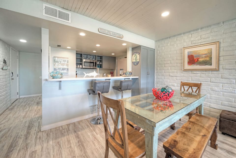 Dining area and fully equipped kitchen.