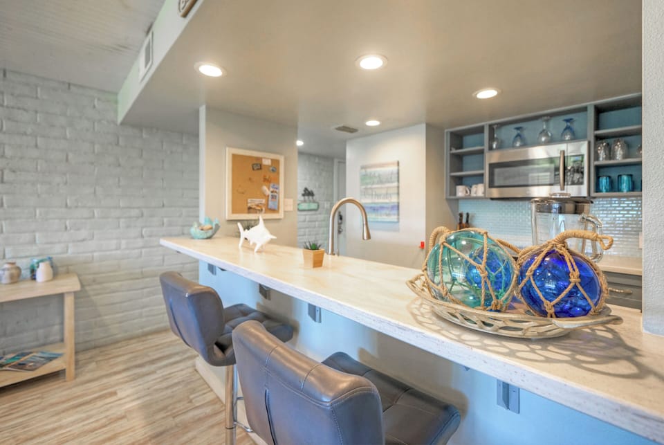 Barstool seating at the kitchen counter.